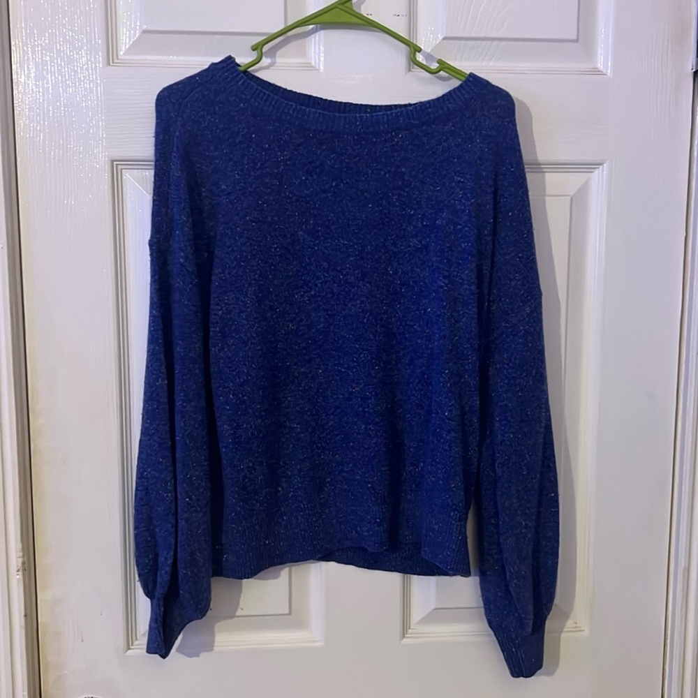 Blue long sleeve sweater with colorful spots